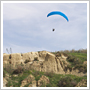 Flying along sand dunes